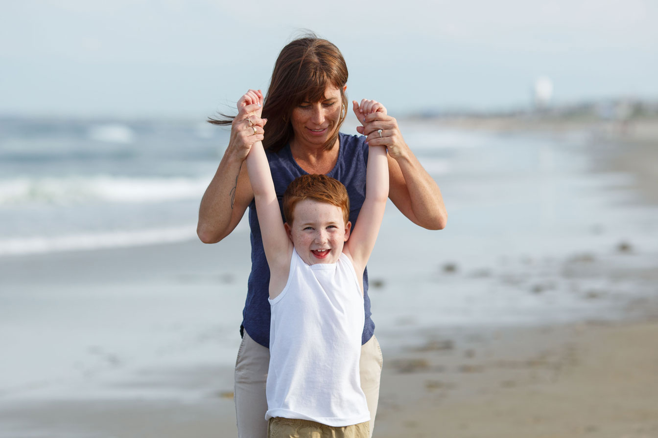 Charlie and his mom on the beach