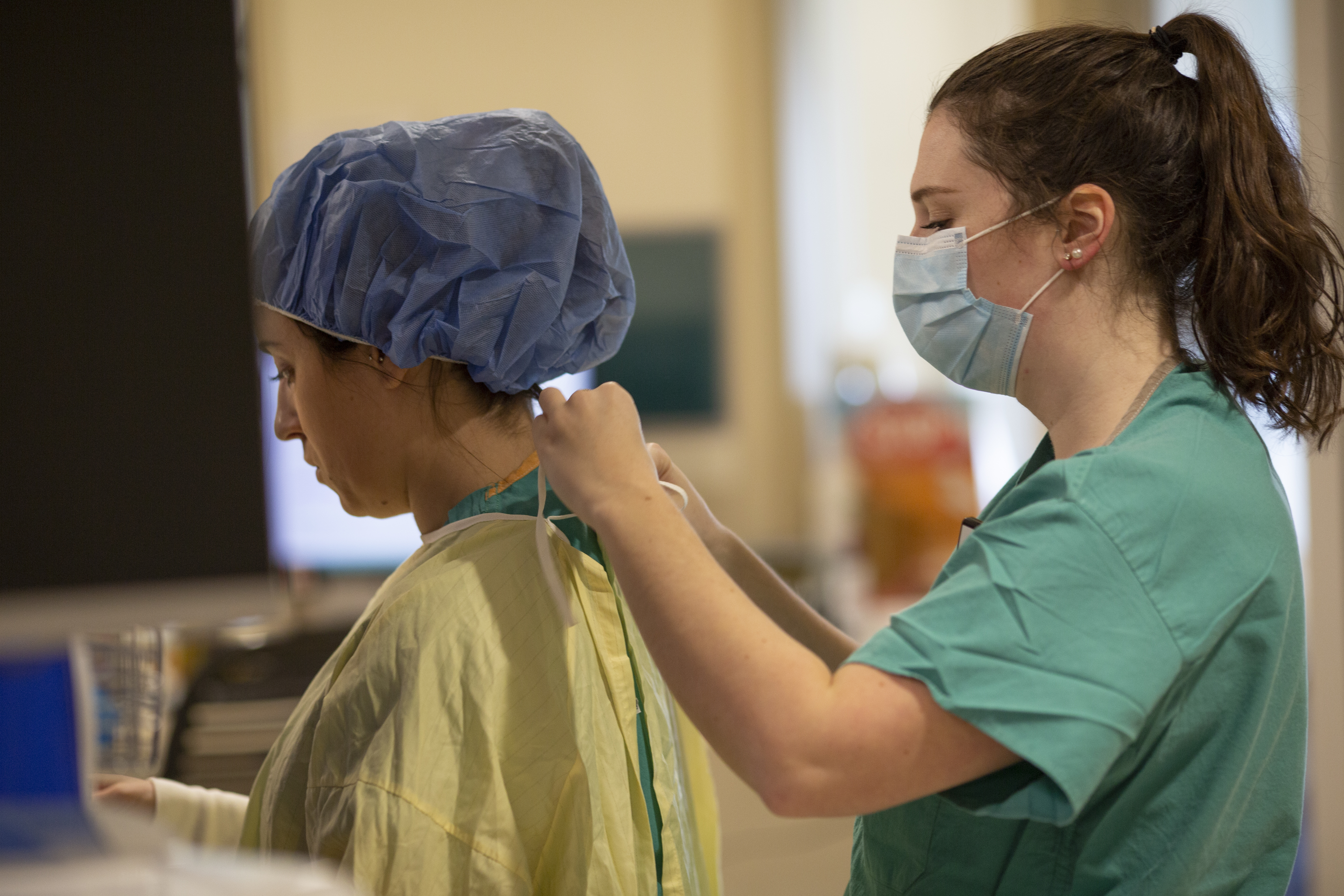 Nurses helping one another