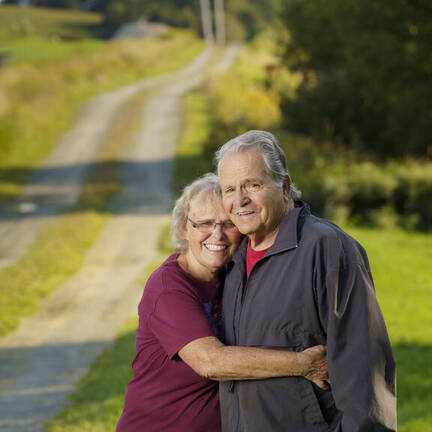 Normand and Sarah embracing