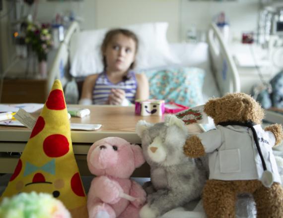 child in hospital bed