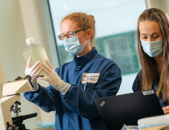 Co-leading the wastewater surveillance project team for D-H are (l-to-r) medical microbiologist Isabella Martin, MD, and clinical chemist Jacqueline Hubbard, PhD. Both are assistant professors of pathology and laboratory medicine at Geisel. The project coordinator is Gregory Tsongalis, PhD, vice chair for research and director of the Laboratory for Clinical Genomics and Advanced Technology in the Department of Pathology and Laboratory Medicine at D-H.