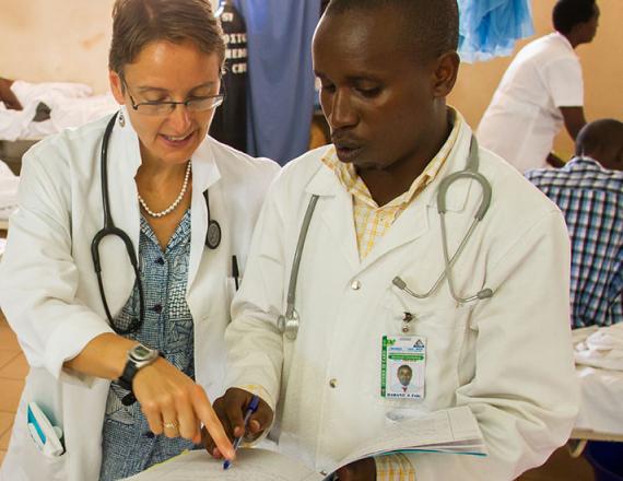 Lisa V. Adams, MD, MED ’90 (center), directs the new Center for Global Health Equity and builds partnerships worldwide, including in Rwanda.