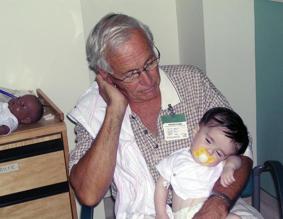 Early in 2004, James Savarese D’88 and his family were flourishing. He was growing a fledgling business into a multimillion dollar company and his wife, Eileen Savarese, had given birth to their first child, Charlie. Charlie Savarese and his grandfather Chuck Ripp, napping together after one of Charlie’s chemotherapy treatments. Photo courtesy James and Eileen Savarese.