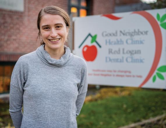 Student Christa Kuck in front of Good Neighbor Health Clinic