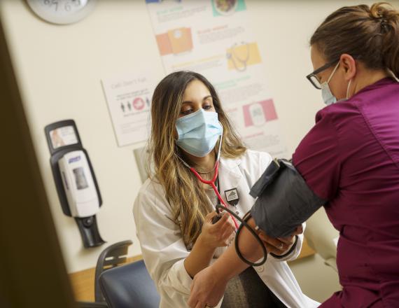 Chaudry Hannah, MD with patient