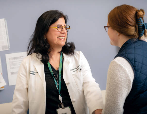 Linda Vahdat, MD with a patient