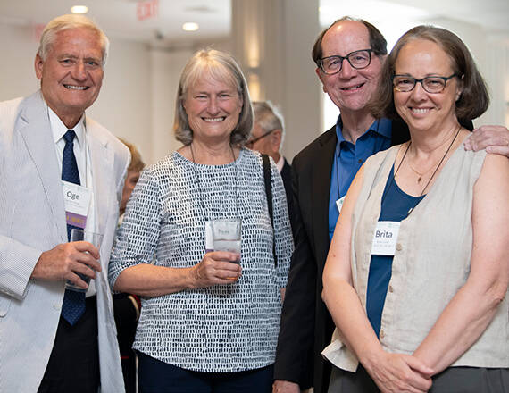 (From left to right) Oglesby H. Young, MD (MED ’75), Pamela R. Young, Daniel R. Lucey, MD, MPH (MED ’81, D ’77), and Brita S. Reed Lucey, PsyD, MD, MTS (MED ’82, D ’76) enjoy the reception before the 2024 annual Pinnacle Society Luncheon.