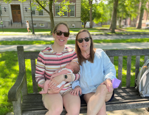 Kerry Reynolds (right) with daughter Meredith (left) and granddaughter Tess on the Dartmouth Green, June 4, 2022. This photo was taken one week after Kerry's double mastectomy, which followed Tess’s birth by two weeks (May 11, 2022). Kerry says Tess’s arrival was "part of the reason" behind her decision to undergo the procedure.