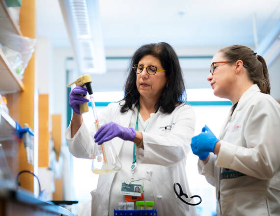 Linda Vahdat with lab member