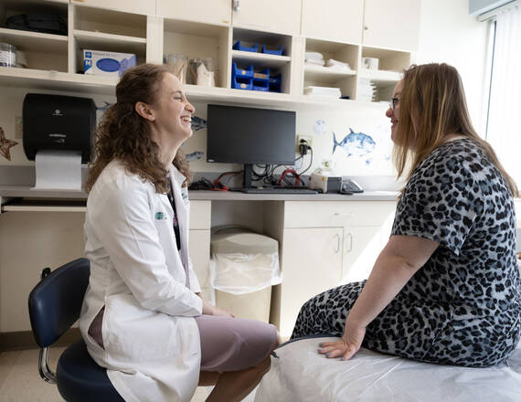 Dermatologist with Patient