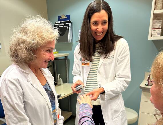 Dermatologist with Patient